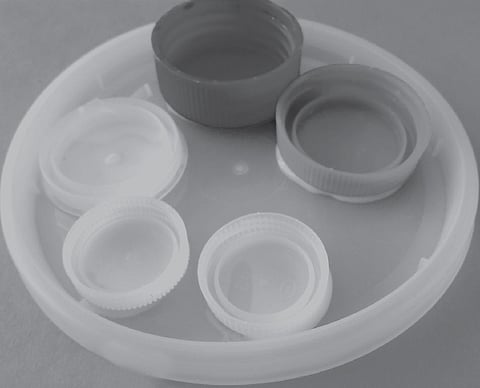 Save bottle caps to make a colour palette of odd shapes