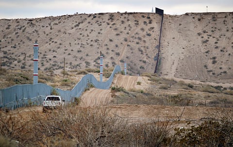 In this Jan. 4, 2016 file photo, a U.S. Border Patrol agent drives near the U.S.-Mexico border fence in Sunland Park, N.M. | AP