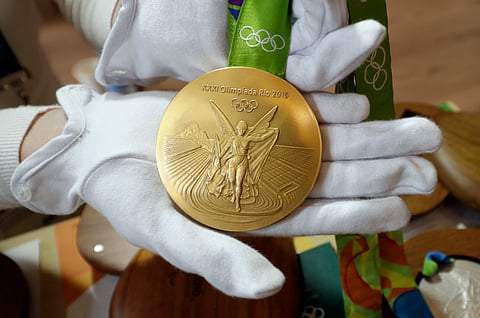 A Rio 2016 Olympic gold medal is displayed at the Olympic Park. |AP