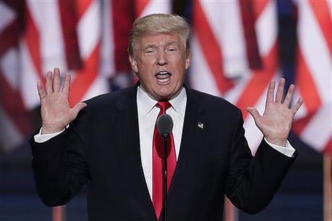 Republican presidential nominee and former US President Donald Trump arrives to speak at the Johnny Mercer Theatre Civic Center, Tuesday, Sept. 24, 2024, in Savannah, Ga.