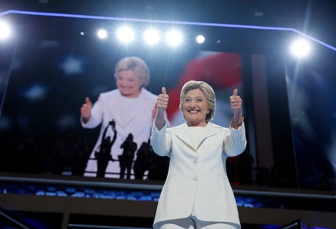 Democratic presidential nominee Hillary Clinton gives her thumbs up as she appears on stage during the final day of the Democratic National Convention in Philadelphia, Thursday, July 28, 2016. | AP Photo