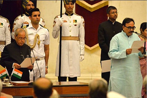 The President, Shri Pranab Mukherjee administering the oath as Minister of State to Dr. Mahendra Nath Pandey, at a Swearing-in Ceremony, at Rashtrapati Bhavan, in New Delhi on July 05, 2016. | PIB
