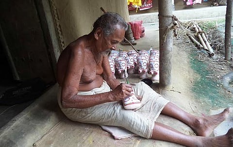 Artisan gives shape to mini idols for a living
