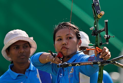 India's Bombayla Devi Laishram releases her arrow during the women's team archery competition at the Sambadrome venue during the 2016 Summer Olympics in Rio de Janeiro, Brazil, Sunday, Aug. 7, 2016. | AP