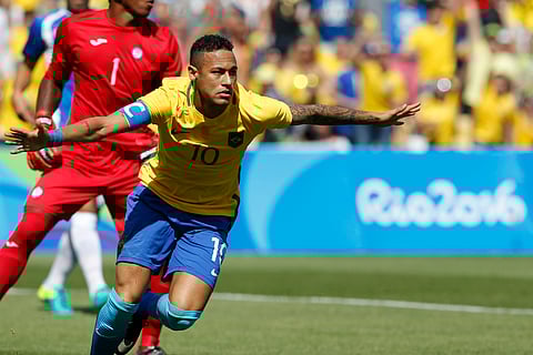 Brazil's Neymar celebrates after his side's first goal during a semifinal match of the men's Olympic football tournament against Honduras at the Maracana stadium in Rio de Janeiro, Brazil, Wednesday Aug. 17, 2016. | AP