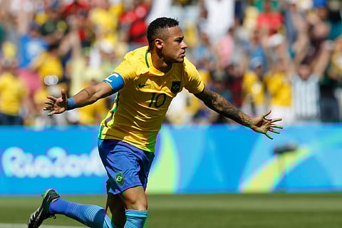 Brazil's Neymar celebrates scoring his side's first goal during a semi-final match of the men's Olympic football tournament between Brazil and Honduras at the Maracana stadium in Rio de Janeiro, Brazil. | AP