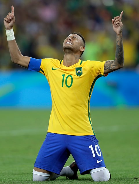 Brazil's Neymar celebrates scoring his side's first goal during the final match of the men's Olympic football tournament between Brazil and Germany(Photo|AP)