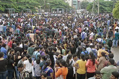 KIIT students protest outside the campus (Photo | Express)