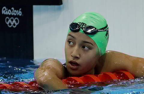 Nepal's Gaurika Singh looks up after winning a heat of the women's 100-meter backstroke during the swimming competitions at the 2016 Summer Olympics in Rio de Janeiro, Brazil. (AP)