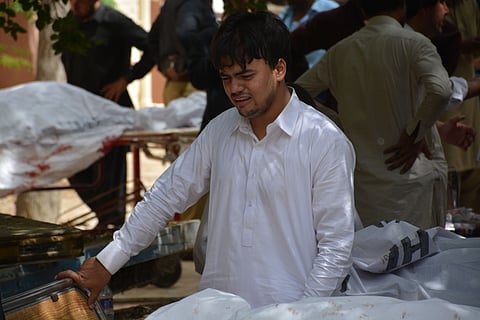 A Pakistani man mourns the death of a family member who was killed in a bomb blast, in Quetta, Pakistan, Monday, Aug. 8, 2016. | AP