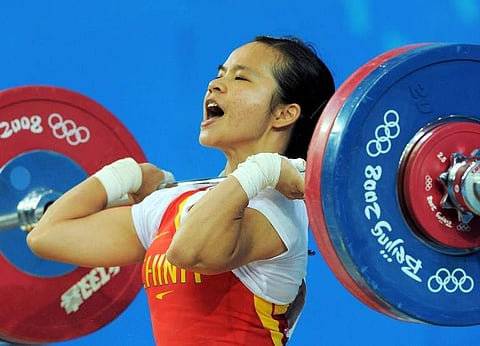 Chen Xiexia of China competes in the women's 48kg weightlifting event during the 2008 Beijing Olympic Games. (File|AFP)