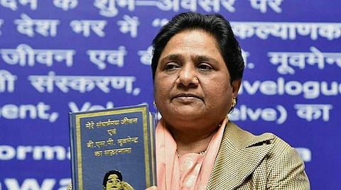 Bahujan Samaj Party BSP supremo Mayawati releasing a book 'A Travelogue of my Struggle-ridden Life and BSP Movement' on her 61st birthday in Lucknow on Sunday.(Photo | PTI)