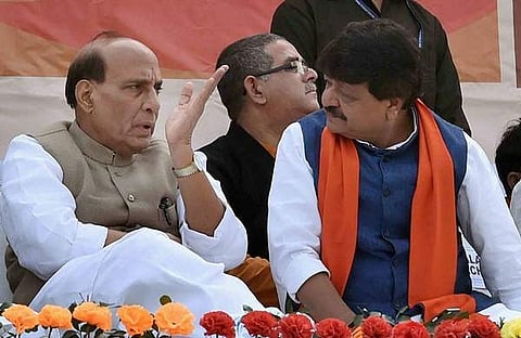 (File Photo | PTI) Union Home Minister Rajnath Singh (L) with Kailash Vijayvargiya during an open rally at Ashok Nagar in North 24 Parganas.
