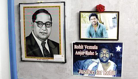 Rohith’s family has put up his photos along side the portrait of BR Ambedkar at their home on the outskirts of Guntur | Sathya Keerthi