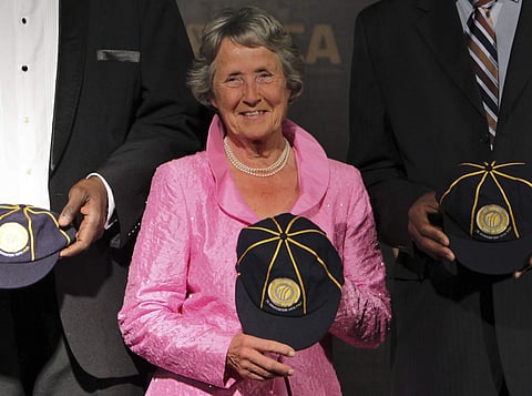 In this Wednesday, Oct. 6, 2010 file photo, former cricketer from England Rachael Heyhoe Flint, center, flanked by West Indies Joel Garner, left, and Courtney Walsh. | AP