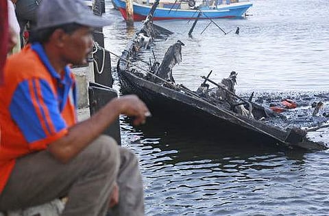 The wreckage of a ferry that caught fire off the coast of Jakarta at Muara Angke Port on January 1. (Photo | AP)