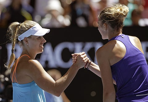 Germany's Angelique Kerber, left, is congratulated by Kristyna Pliskova of the Czech Republic after winning their third round match at the Australian Open tennis championships in Melbourne, Australia. | AP