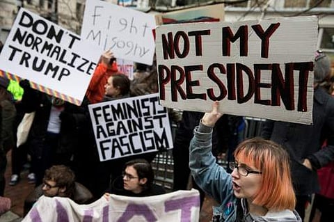 Demonstrators in Washington protest the swearing-in of Donald Trump as US President. (Photo | AFP)