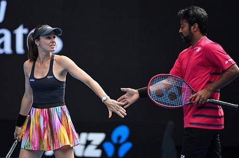 Leander Paes and his Swiss partner Martina Hingis. | AFP