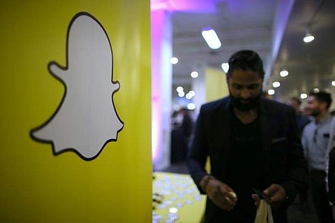 The logo of messaging app Snapchat is seen at a booth at TechFair LA, a technology job fair, in Los Angeles, California, U.S., January 26, 2017. REUTERS