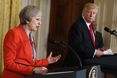 British Prime Minister Theresa May (L) and US President Donald Trump | AP