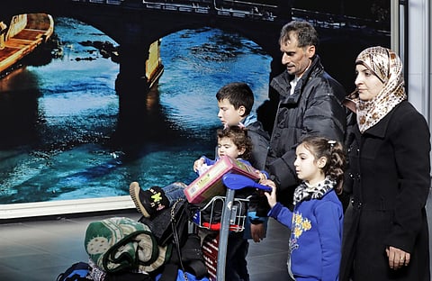 Syrian refugees from Homs leave Rome's Fiumicino international airport, Monday, Jan. 30, 2017. (AP)