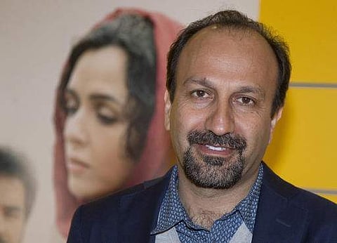 Iranian director Asghar Farhadi poses for a photo during the premiere of his film, 'The Salesman, in Paris in 2016. (File Photo | AP)