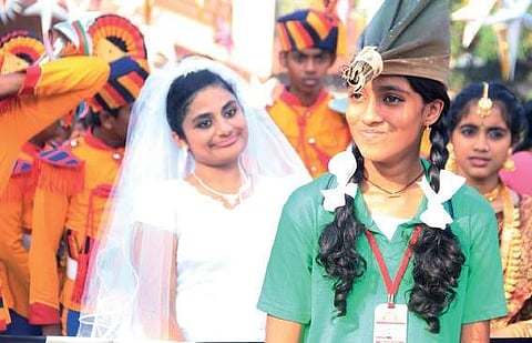Students taking part in the procession taken out as a part of the Ernakulam Revenue School Youth Festival at North Paravoor on Tuesday | Pics K Shijith