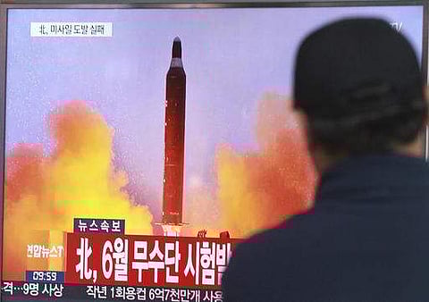 A man watches a news programme showing a missile launch conducted by North Korea. (File | AP)