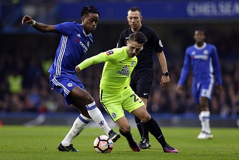 Chelsea's Nathaniel Chalobah, left, vies for the ball with Peterborough United's Tom Nichols during the English FA Cup third round soccer match. (Photo | AP)