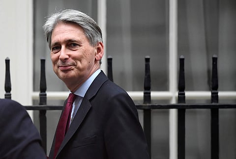 Britain's Chancellor of the Exchequer, Philip Hammond, leaves Downing Street in central London. (Photo | Reuters)