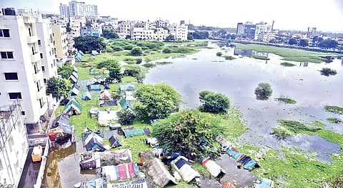 Huts submerged in the overflowing Ramanthapur lake in Hyderabad on Wednesday | Vinay Madapu