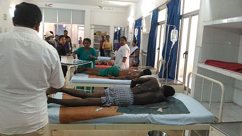 Injured labourers undergoing treatment at Tisco Hospital in Joda. (EPS)