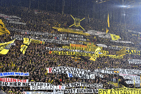 In this Feb. 4, 2017 file photo, Dortmund's supporters protest against the Red Bull owned RB Leipzig club prior the German Bundesliga soccer match between Borussia Dortmund and RB Leipzig in Dortmund, Germany. | AP