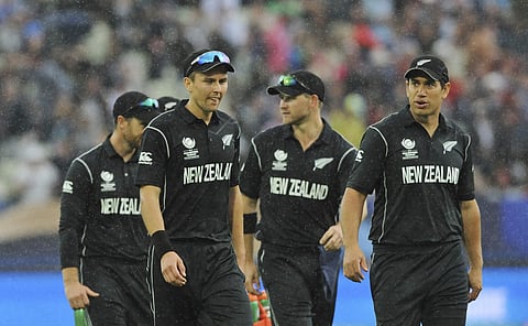 New Zealand's Trent Boult, front left, and Ross Taylor, right.|AP