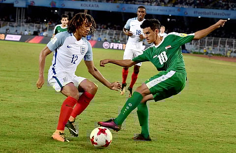 Players of England (white) and Iraq (green) during FIFA U-17 World Cup 2017 in Kolkata on Saturday. (Photo | PTI)