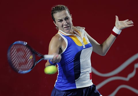 Anastasia Pavlyuchenkova of Russia returns a shot to Daria Gavrilova of Australia during the final match at the Hong Kong Open. | AP