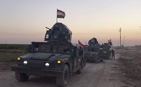 Iraqi soldiers on military vehicles in the Qatash area towards Kirkuk gas plant. (Photo | AP)