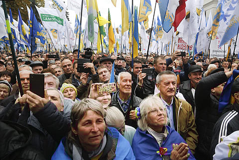 Supporters listen to former Georgian President Mikheil Saakashvili during a rally outside the Ukrainian parliament in Kiev. (Photo | AP)