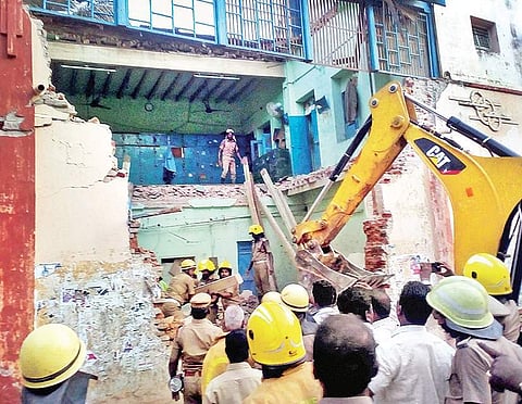Firemen rescued three people after the retiring room at the Porayar bus depot in Nagapattinam collapsed on Friday | pti