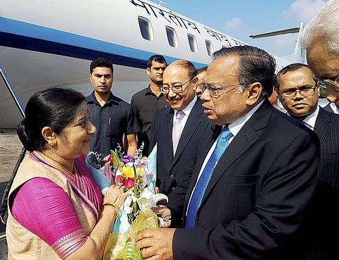 External Affairs Minister Sushma Swaraj being welcomed by her Bangladeshi counterpart Abul Hassan Mahmood Ali on her arrival in Dhaka on Sunday.