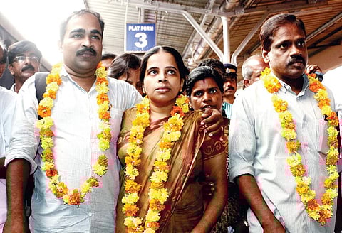 Jishnu Pranoy’s mother Mahija, father Ashokan and uncle Sreejith at Kozhikode railway station. (File | Express Photo Service)