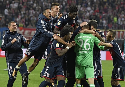 Bayern Munich's team celebrate after winning the German soccer cup, DFB Pokal, match against RB Leipzig. | AP