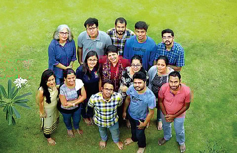 Rajlakshmi (in maroon) with her team
