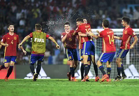 Spain players celebrate after defeating Mali during the FIFA U-17 World Cup Semi final match at D Y Patil Stadium in Mumbai on Wednesday. (Photo: PTI)