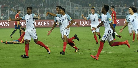 England players celebrate win during FIFA U-17 World Cup 2017 final over Spain in Kolkata on Saturday. The Three Lions colts hammered The La Rojas juniors 5-2 in the highest-scoring final in the history of this age-group tournament. | PTI