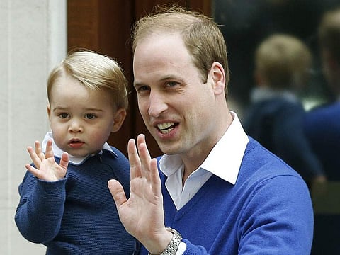 Prince William with his son Prince George (Photo | AP)