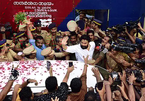 Fans of Dileep cheering for the actor as he makes his way out of the Aluva Sub Jail on bail after 85 days in prison in Kochi. (Albin Mathew | EPS)