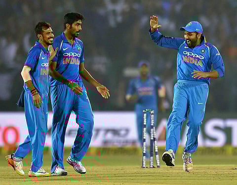 Indian playes celebrate the wicket of New Zealand batsman Tom Latham during third ODI in Kanpur on Sunday. For the better part of the match, Indian bowlers dished out an ordinary bowling performance but bounced back  in the death overs. | PTI