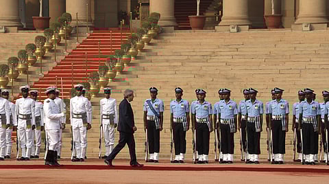 Italian Prime Minister Paolo Gentiloni, center, inspects a guard of honour during his ceremonial reception at the Indian presidential palace in New Delhi | AP